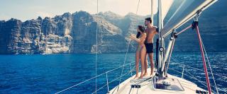 Couple on sailboat image